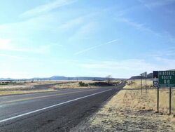 Route 66 road sign near Seligman, Arizona, United States Stock Footage