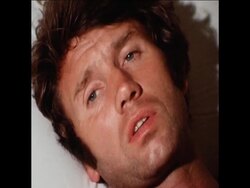 SYND  07/06/1970 A WOUNDED REPORTER LYING IN HOSPITAL BED TALKING TO COLLEAGUE News Clip