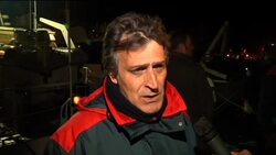 Coast Guard vessel rescues immigrants from sinking boat News Clip