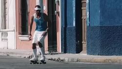 Young adult male rollerblade in urban street Stock Footage