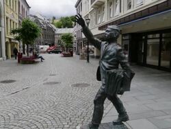 Alseund, statue of a boy in  Konges street Stock Footage