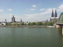 WS Shot of Cologne Cathedral at Old City with train bridge with Blue sky / Cologne, North Rhine-Westphalia, Germany Stock Footage