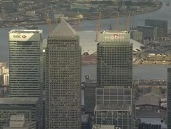 Aerial M/S Canary Wharf & Canada Tower with O2 Arena in background Stock Footage