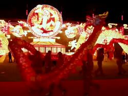 MS TS People performing dragon dance at city wall new year lantern festival  AUDIO  / xi'an, shaanxi, china Stock Footage