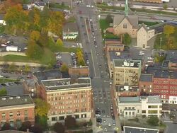 WS ARIEAL View of Vehicles moving on street at Bangor / Maine, United States Stock Footage