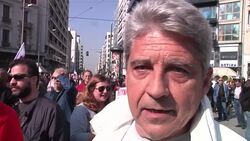 Thousands march during general strike as unions protest income cuts Instructional Video