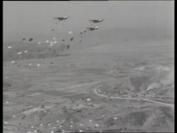 B/W 1950's wide shot of parachutes dropping from airplanes / C119 "Boxcar" / Korea / NO SOUND Stock Footage