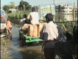 AP Cover of the floods which have displaced millions of people News Clip
