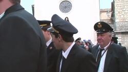 Italy, Orsara, Easter celebration, the band accompanies statue of Our Lady following the hooded men Stock Footage