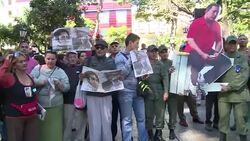 CLEAN : Venezuela pro govt protest defies opposition with Chavez photos News Clip