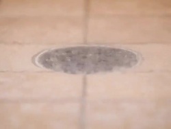 Residential Tiled Shower Drain with Running Water Stock Footage