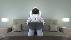 Astronaut Sitting On Couch And Working With Computer Stock Footage