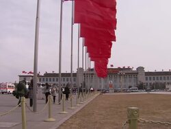 Red flags blowing in Tiananmen Square News Clip