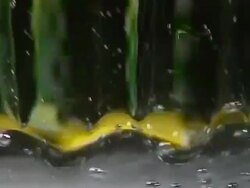Close up of spinning glass with mineral water Stock Footage