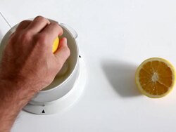 Squeezing oranges Stock Footage