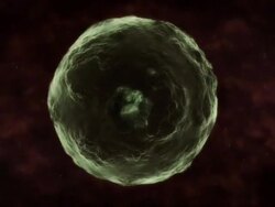 Medium Close Up pan-right tracking-left - A spinning amoeba divides and replicates in a computer-generated animation. Stock Footage