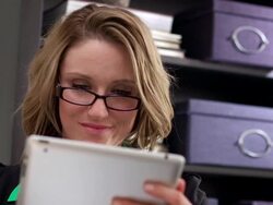 Businesswoman uses a tablet in her office Stock Footage
