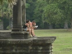 ZO Tourists studying travel books at Angkor Wat / Cambodia Stock Footage