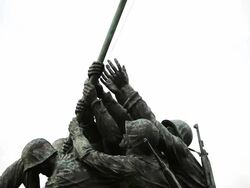 A panning down shot of the Marine Corps War Memorial on an overcast day. Stock Footage
