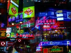 MS Neon signs on Kowloon street, Hong Kong Stock Footage