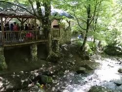 Dilijan national park, people in a picnic over the river Stock Footage