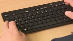 Male Caucasian Hands Typing on Keyboard News Clip