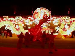 MS TU People performing dragon dance at city wall new year lantern festival  AUDIO  / xi'an, shaanxi, china Stock Footage