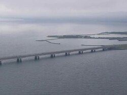 WS AERIAL ZI End of Great Belt Bridge at Nyborg on Funen / Funen, Denmark Stock Footage