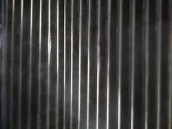 Burn wood factory close up zinc door Stock Footage