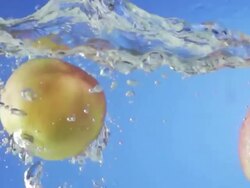 Red Apples Splashing Into Water (Super Slow Motion) Stock Footage