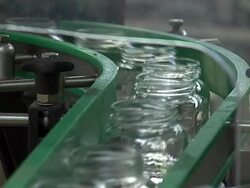 Glass jar on conveyor line Stock Footage