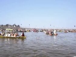 WS TS View of pilgrims in boats during Kumbh Mela on River Ganges / Allahabad, Uttar Pradesh, India Stock Footage
