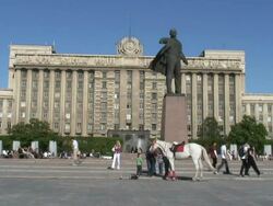  WS View of Lenin statue in front of official building / Saint Petersburg, Russia   Stock Footage