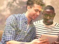 MS Two young men sitting and talking Stock Footage