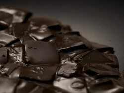 Melting chocolate blocks Stock Footage