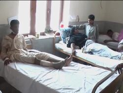 AP cover of injured in hospital after blast which killed at least 9 News Clip