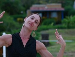 MS Shot of sitting woman dancing her hand / Montezuma, Costa Rica Stock Footage