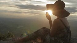 woman and smartphone at wonderful viewpoint Stock Footage