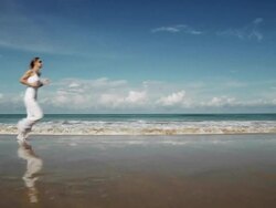 Jogging at the beach (HD 720) Stock Footage