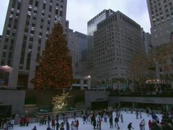HA Skaters ice skating at rink in Rockefeller Plaza / New York City, New York, United States Stock Footage