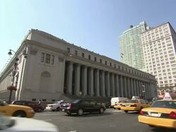 MS, Traffic in front of James A. Farley Building (U.S. General Post Office), Manhattan, New York City, New York, USA Stock Footage