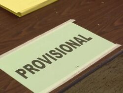 MS, ZO, Signs hanging on registration table at polling place, Toledo, Ohio, USA Stock Footage