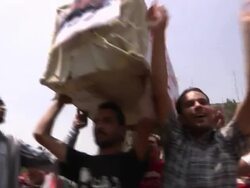 Protesters Carry Empty Coffin in Tahrir Square News Clip