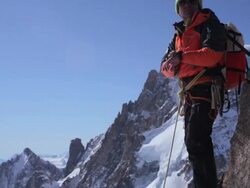 TU Mountaineer using GPS  in high mountains/French Alps Stock Footage