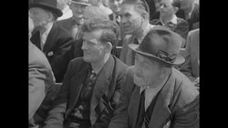 German workers listening to speech by President Heuss during May Day celebration in Berlin News Clip