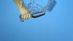 HD Super Slow-Mo: Washing A Champagne Flute Stock Footage