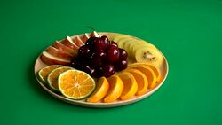 mixed fruit on wood plate Stock Footage