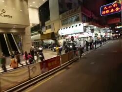 MS POV People walking in front of shops / Hong Kong, China Stock Footage