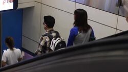 Crowded people in the mass public transportation using their phone while waiting Stock Footage