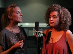 Females singing duet in recording studio Stock Footage